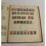 NEW IDEAL STAMP ALBUMS two sparse albums with various World used and mint stamps from the 19thc