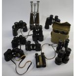 VARIOUS PAIRS OF BINOCULARS a mixed group including an elongated pair of binoculars by G