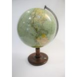 EARLY 20THC TABLE GLOBE a early 20thc globe, mounted on a wooden stand with inset compass and