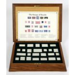 CASED SILVER STAMPS - THE STAMPS OF ROYALTY 25 silver replicas of British stamps, with a card