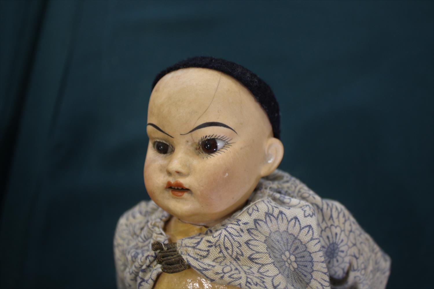 BISQUE HEAD ORIENTAL DOLL with a bisque head with fixed brown eyes, composition body and limbs and - Image 4 of 10