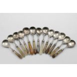 A SET OF NINE 19TH CENTURY CONTINENTAL SPOONS with fig-shaped bowls, agate handles and reeded