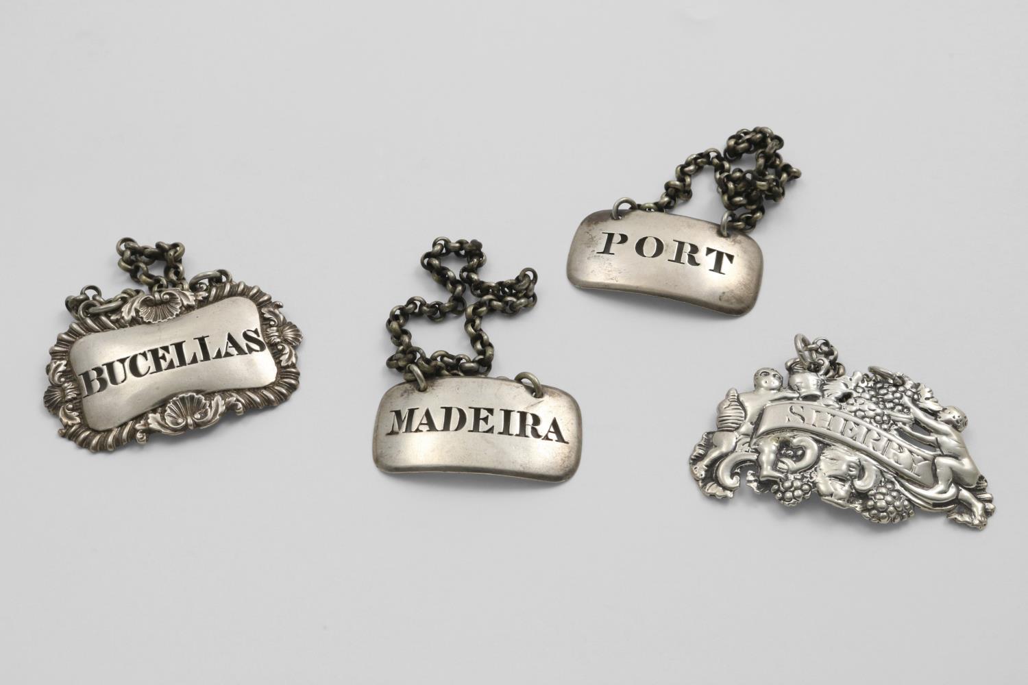 A PAIR OF GEORGE IV WINE LABELS pierced "PORT" & "MADEIRA" by C. Reily & G. Storer, London 1828,