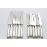 A SET OF SIX ELIZABETH II OLD ENGLISH PIP PATTERN TABLE KNIVES AND SIX CHEESE KNIVES to match with