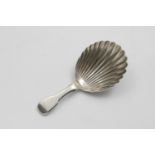 A SCOTTISH PROVINCIAL FIDDLE PATTERN CADDY SPOON with a fluted shell bowl, by Andrew Davidson of