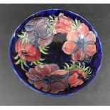 LARGE MOORCROFT BOWL - 1983 a large bowl in the Anemone design on a blue ground, marked to the