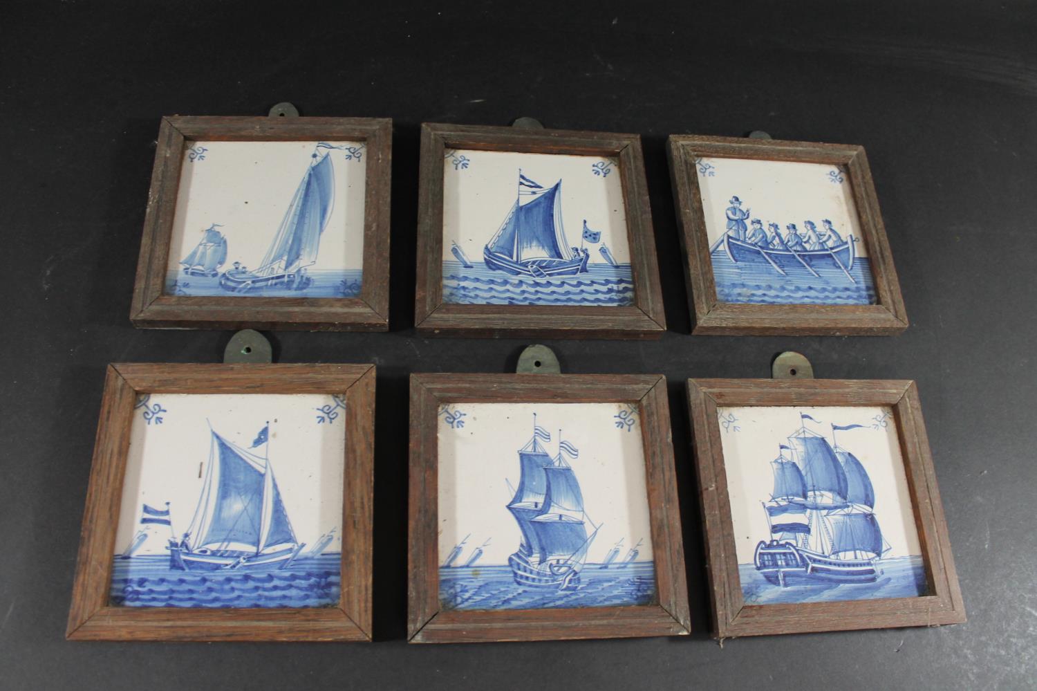 FRAMED DELFT BLUE & WHITE TILES six 18thc delft tiles, each painted with a variety of figures within - Bild 2 aus 2