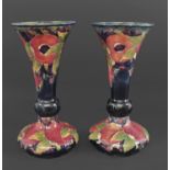 PAIR OF WILLIAM MOORCROFT VASES - POMEGRANATE a large pair of vases with a trumpet shaped neck, in