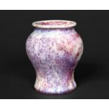RUSKIN MINIATURE HIGH FIRED VASE a squat miniature vase with a high fired glaze, small firing