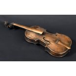 CAST OF A BRONZE VIOLIN a cast of a full length violin, complete with tailpiece which can be