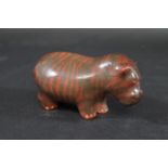 SIDDIG EL NIGOUMI (1931-1996) POTTERY HIPPO - 1988 a small pottery model of a Hippo with a stripe