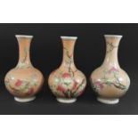 SET OF THREE CHINESE PORCELAIN VASES a set of three 20thc vases, the bottle shaped vases painted