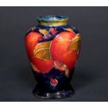 MINIATURE MOORCROFT VASE - POMEGRANATE a miniature vase painted in the Pomegranate design on a