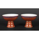 PAIR OF CHINESE CORAL STEM BOWLS 19thc, the circular bowls supported on tapering bases, with a