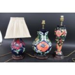 MOORCROFT LAMP - POPPY a large modern lamp in the Poppy design, with a wooden base (35cms high to