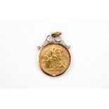 A GOLD HALF SOVEREIGN 1925, in a 9ct gold pendant mount, total weight 5.4 grams