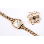 A LADY'S 9CT GOLD WRISTWATCH BY ROTARY the signed cushion-shaped dial with baton numerals, quartz