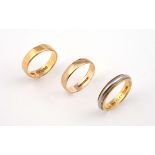 AN 18CT GOLD WEDDING BAND 3.7 grams, size L, together with a n 18ct gold and platinum band, 6.2