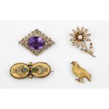 AN AMETHYST AND PEARL SET BROOCH the oval-shaped amethyst is set within an ornate gold mount set