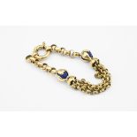 AN 18CT GOLD AND LAPIS LAZULI BRACELET the circular link bracelet is mounted with two lapis lazuli