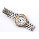 A LADY'S STAINLESS STEEL AND 18CT GOLD DISCOVERY DIVERS WRISTWATCH BY EBEL the signed white circular