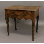 A GEORGE II WALNUT SIDE TABLE, the feather-banded top above a single frieze drawer and wavy apron,