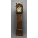 AN EARLY 18TH CENTURY WALNUT LONGCASE CLOCK, the 11" brass dial with date aperture and subsidiary