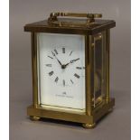 A BRASS CARRIAGE CLOCK, by Matthew Norman, on a brass eight day eleven jewels movement stamped