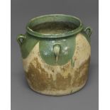 A SPANISH TERRACOTTA OLIVE JAR, of squat circular form with four loop handles and a green glaze,