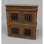 A PARQUETRY INLAID WALNUT FOOD HUTCH, with carved date 1928 to the side and initialled 'HCM', the