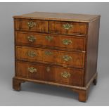 AN 18TH CENTURY CHEST OF DRAWERS, the quarter-veneered top above two short and three long inlaid