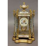 A 19TH CENTURY FRENCH CHAMPLEVE MANTEL CLOCK, the 3 1/2" enamelled dial on a brass eight day