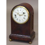A GEORGE III MAHOGANY MANTEL CLOCK, the 5 1/2" dial with Arabic and Roman numerals signed J.F