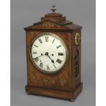A REGENCY BRASS INLAID MAHOGANY BRACKET CLOCK, the 8" enamelled dial on a brass eight day twin fusee