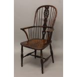 A MID-19TH CENTURY WHEELBACK WINDSOR ARMCHAIR, on turned supports with H-stretcher, stamped 'G.
