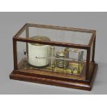 AN EDWARDIAN OAK CASED BAROGRAPH, brass-mounted with silvered bellows and Fahrenheit thermometer,