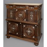 A MOORISH STYLE WALNUT AND MAHOGANY CUPBOARD, the top section with single deep drawer, with turned