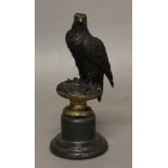 AFTER ARCHIBALD THORBURN, a French bronze study of an eagle on a naturalistic base with Paris