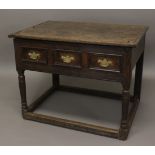 AN 18TH CENTURY OAK SIDE TABLE, the loose planked top above three small drawers on turned legs and