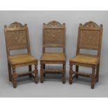 A SET OF SIX CARVED OAK DINING CHAIRS, each with matching carved top rails but with individually