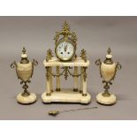 A FRENCH LOUIS XVI STYLE CLOCK GARNITURE, the 3 3/4" dial with swagged flowers on a brass eight
