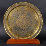 MAMLUK REVIVAL - A LARGE BRASS & SILVER INLAID PLATE. A large brass plate inlaid in silver and