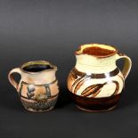 MICHAEL CARDEW (1901-1983) - SLIPWARE WINCHCOMBE JUG. (d) A small jug with yellow and brown slip and
