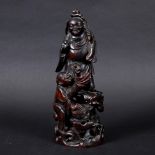 CHINESE BAMBOO CARVED FIGURE. 19thc, a carved figure standing on a rocky outcrop with a figure