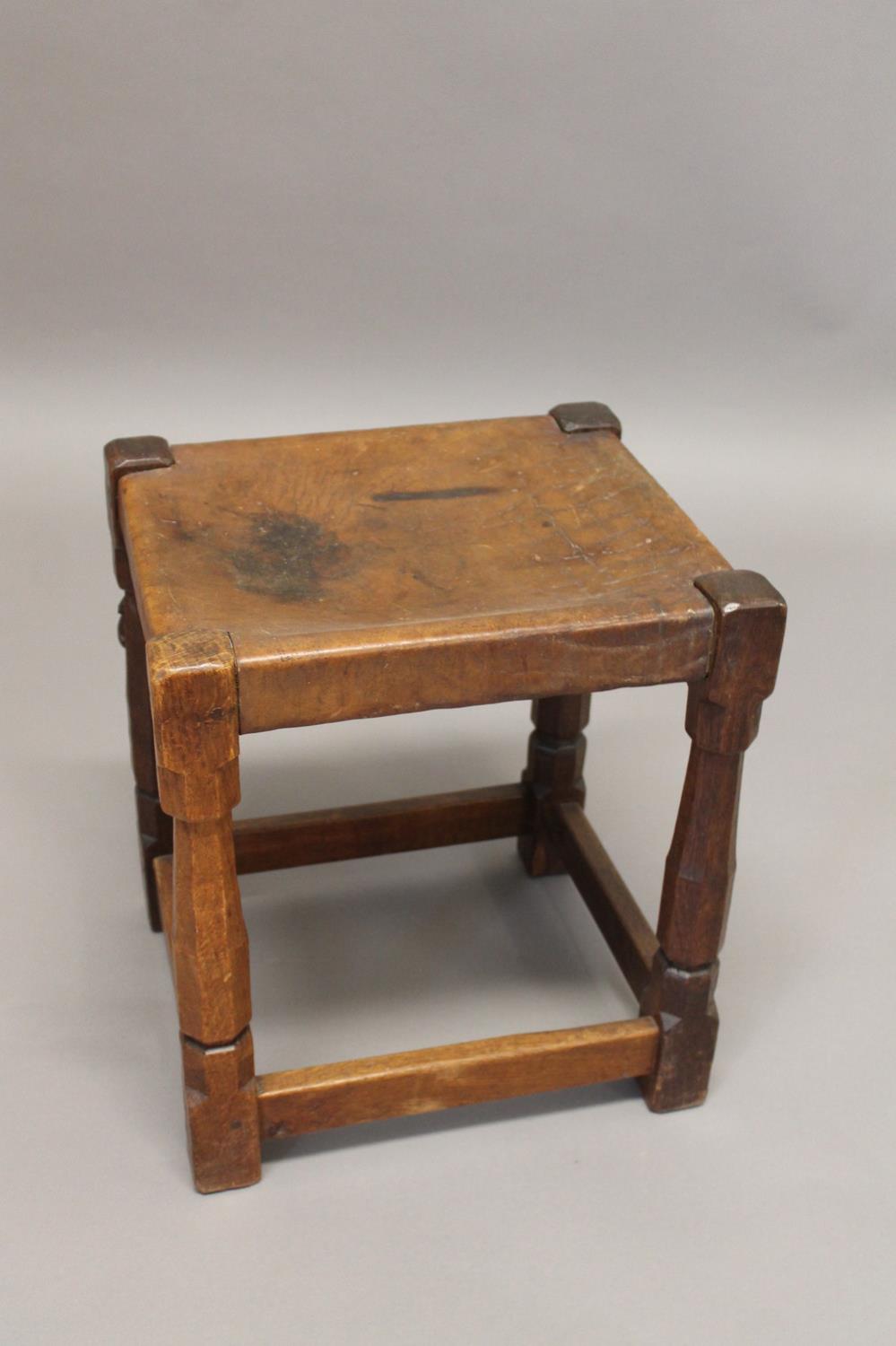 ROBERT THOMPSON OF KILBURN - EARLY MOUSEMAN STOOL. An oak stool with a solid leather seat and - Bild 4 aus 12