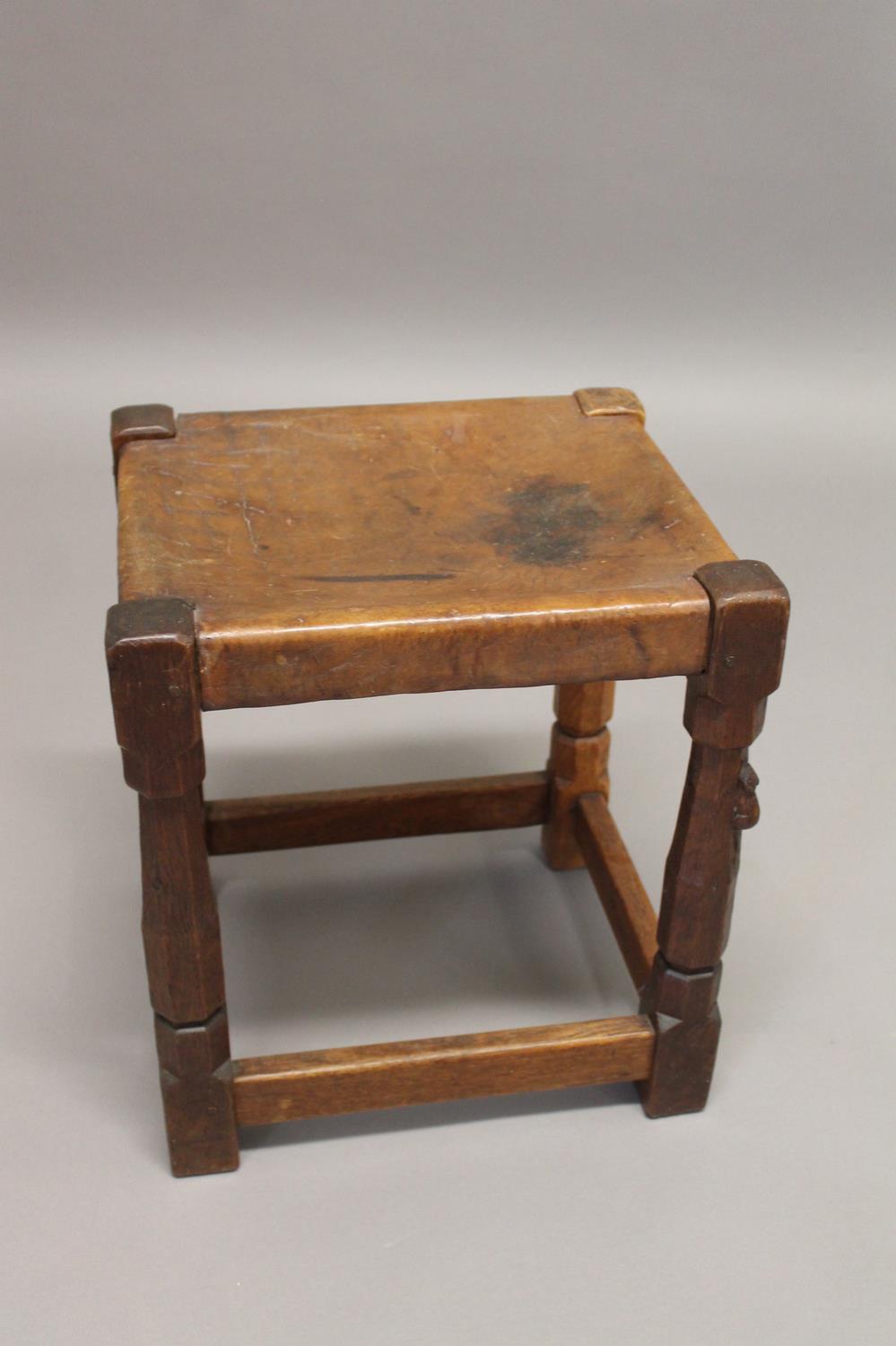 ROBERT THOMPSON OF KILBURN - EARLY MOUSEMAN STOOL. An oak stool with a solid leather seat and - Bild 5 aus 12