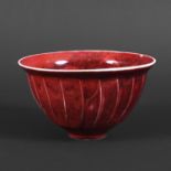 DAVID LEACH (1911-2005) - PORCELAIN BOWL. (d) A fluted porcelain bowl with a copper red glaze, '