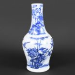 17THC CHINESE BLUE & WHITE TRANSITIONAL PORCELAIN VASE. A 17thc transitional vase with a slender