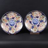 LARGE PAIR OF JAPANESE IMARI CHARGERS. A pair of late 19thc porcelain chargers, with various