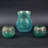 LARGE MONART ART GLASS VASE. A large green glass vase with a swirling design and gold coloured